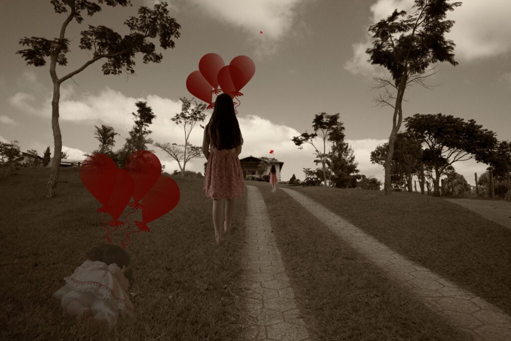 photograph of a girl with balloons depicting the life transition